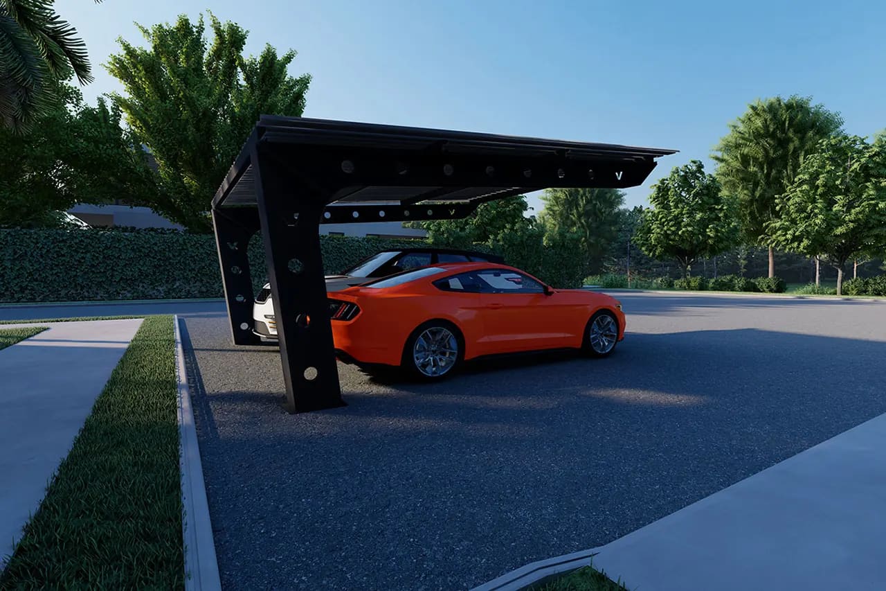 Solarna nadstrešnica Vi-CarPort od tamnog metala sa solarnim panelima na krovu, iznad parking mesta sa narandžastim automobilom, okružena zelenilom.